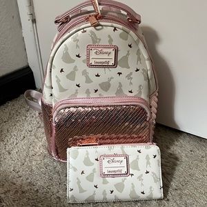 Brand new Disney princess loungefly backpack with matching wallet.